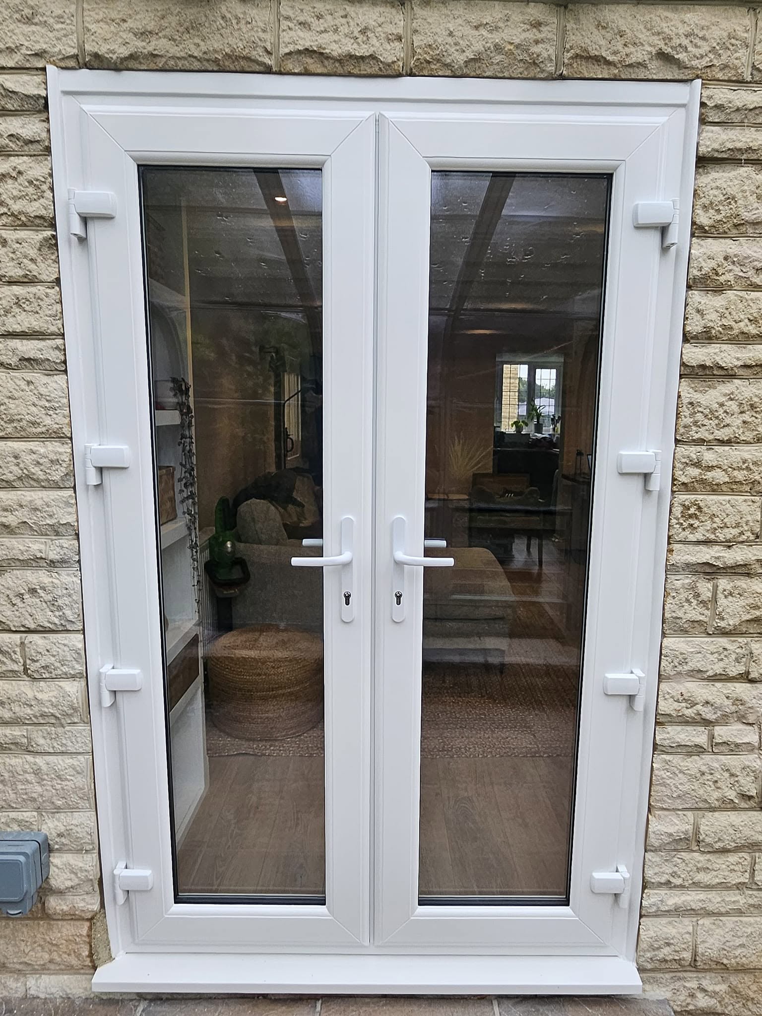 White uPVC French Doors installed in Bussage