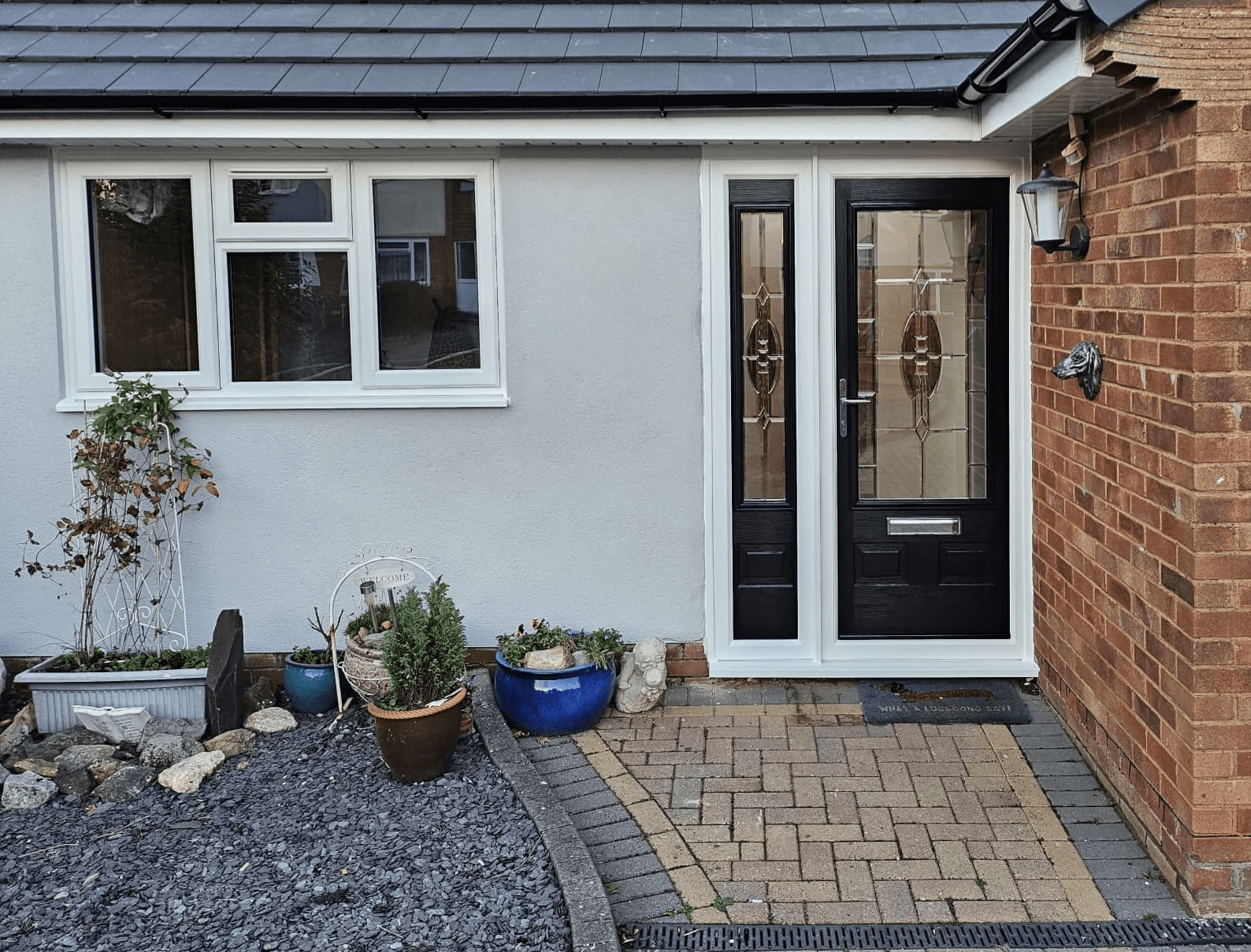 Black Composite Front Door with Composite Sidepanel and Window