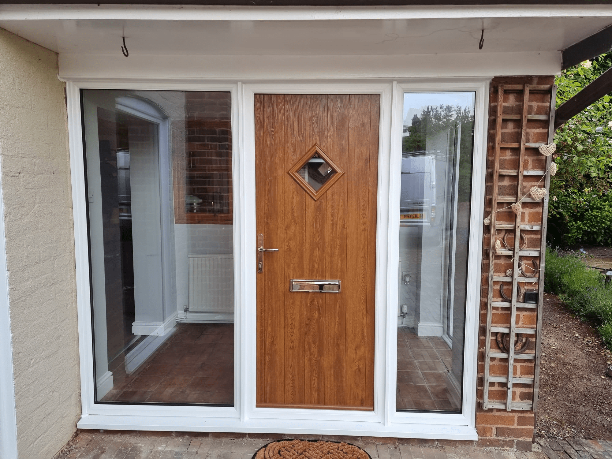 Golden Oak Composite Door with 2 fully glazed side panels