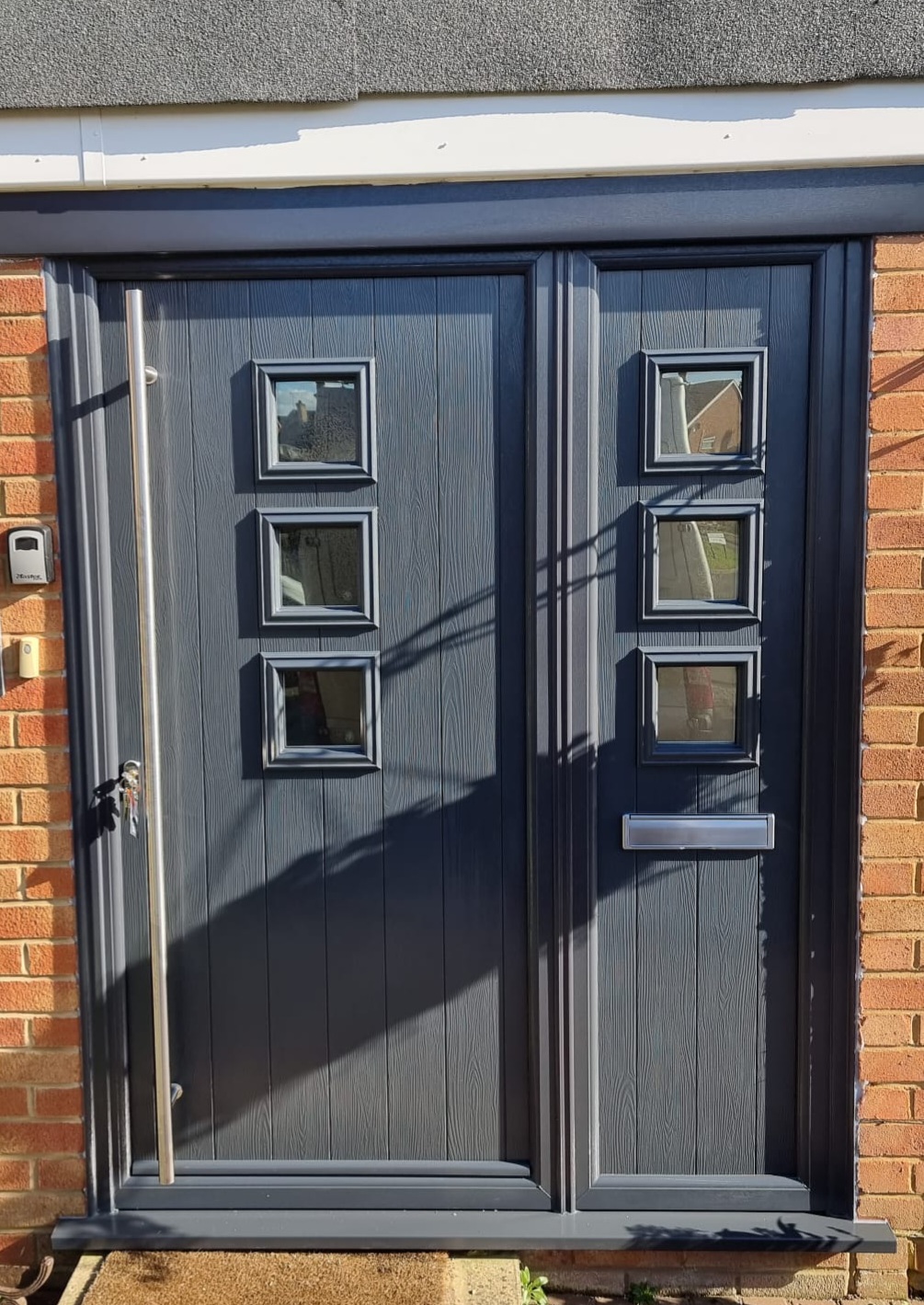 Composite door with composite sidelight in grey