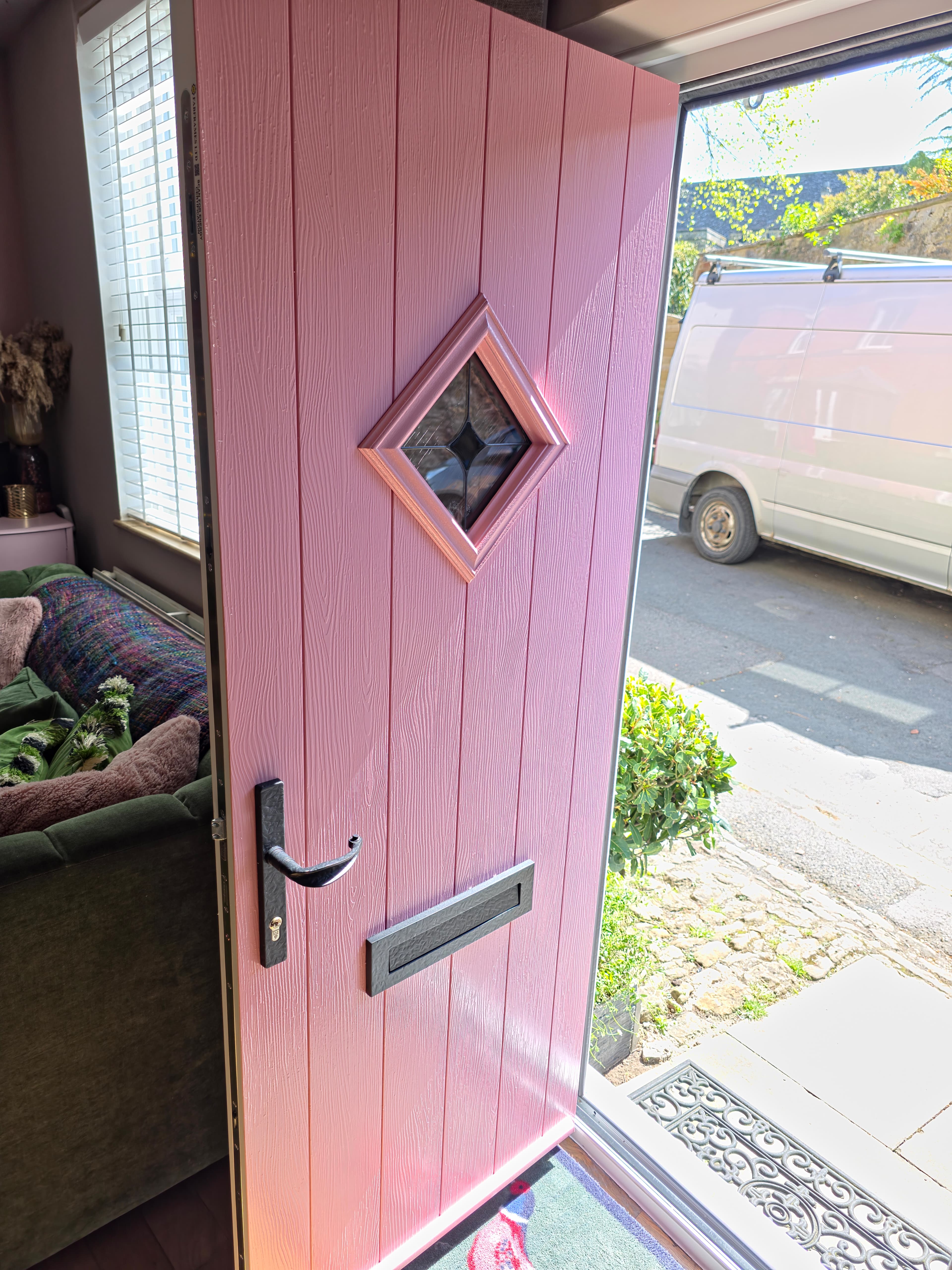 Pink Composite Front Door installed in Highworth