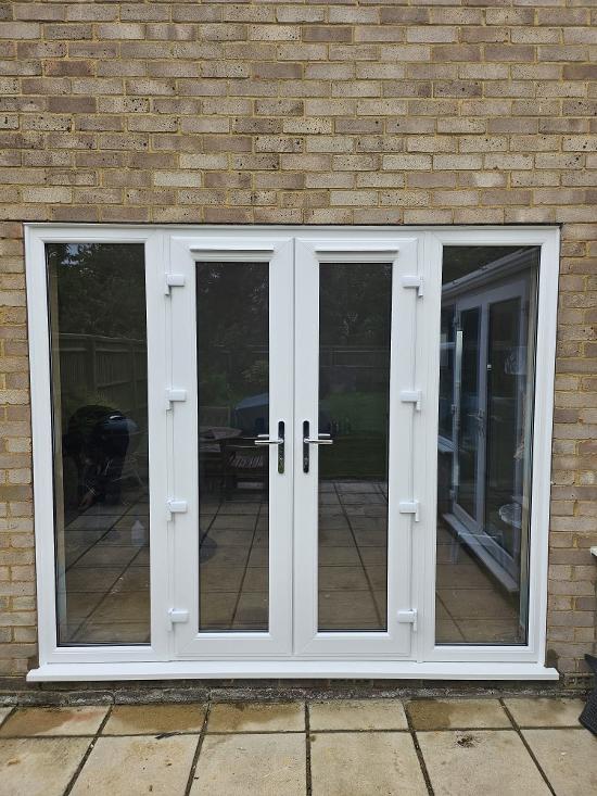 French Doors with fully glazed side panels installed in Chiseldon